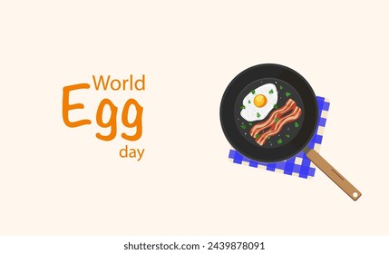  Happy World Egg Day concept with pan and egg
