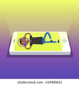 Happy young black man with headphones listening to music on a smartphone screen. Top view / flat editable vector illustration