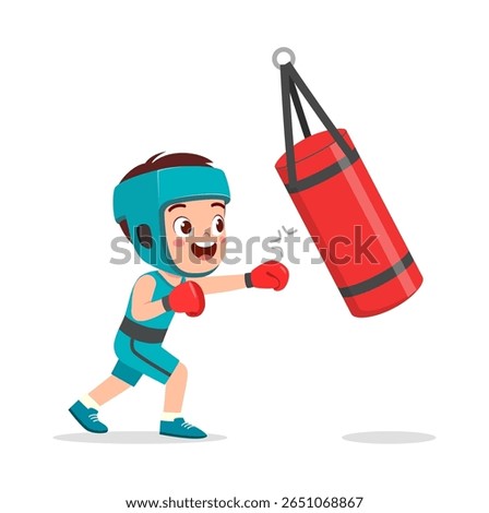 Happy Young Boy Boxing Punching Bag Wearing Boxing Gloves and Helmet with a Determined Face