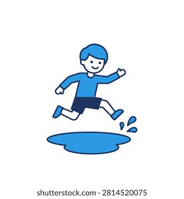 Happy young boy jumping over puddle