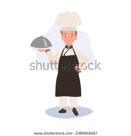 Happy Young Chef Preparing Tasty Meals. Young Kid Chef Serving Food