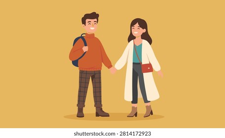 Happy young couple holding hands and walking together in casual autumn clothing against a bright yellow background.