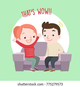 Happy young couple sit and chat on the sofa