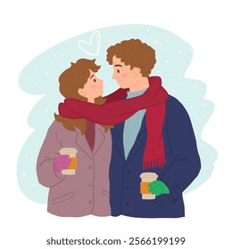 Happy young couple walking in winter and drinking coffee.