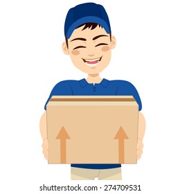 Happy young delivery man holding box delivering mail package