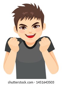 Happy young energetic teenager boy excited with fists up