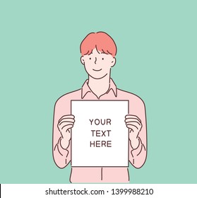 Happy young girl holding/showing/displaying white blank board/banner/poster.Hand drawn style vector design illustrations.