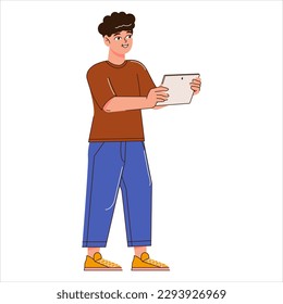 A happy young guy is holding a tablet computer in his hands and looking into it. A man standing isolated on a white background. Vector illustration