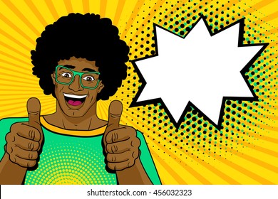 Happy young handsome surprised african man in glasses shows thumb up with open mouth and speech bubble. Vector colorful cartoon background in pop art retro comic style. 