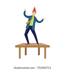 Happy young man, businessman dancing on the table at corporate party in office, flat cartoon vector illustration isolated on white background. Happy smiling man dancing on office at corporate party