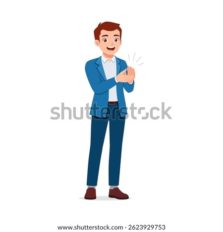 Happy young man clapping hands with smiling face while wearing suit and trousers