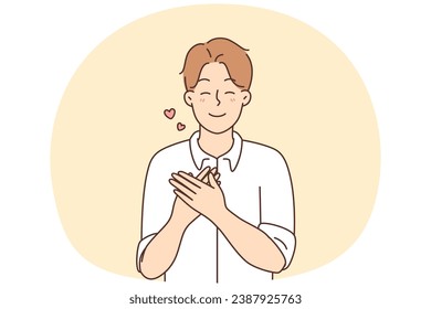 Happy young man hold hands at chest show love and gratitude. Smiling guy demonstrate care and affection feel grateful and thankful. Vector illustration.