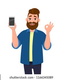 Happy young man showing smartphone and showing okay, OK or O sign. Mobile phone technology concept. Vector illustration in cartoon style.