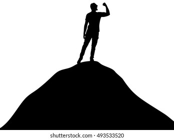 Happy young man standing on the hill