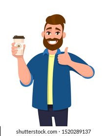 Happy young trendy man holding a coffee cup and showing, gesturing thumbs up sign. Male character design illustration. Modern lifestyle, food and drink. Good, positive, like concept in cartoon.