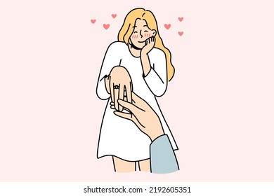 Happy young woman with ring on finger is engaged. Man holding female lover hand make marriage proposal. Ove and relationship. Vector illustration. 