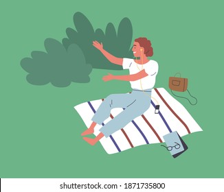 Happy young woman sitting on blanket in park and enjoying music in earphones. Scene of recreation outdoors and summer leisure. Flat vector cartoon illustration of relaxing female character