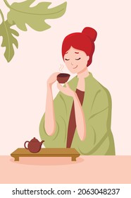  Happy young woman with tea