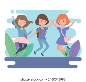 happy young women celebrating jumping in the field