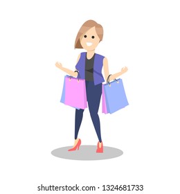 Happy young women with shopping bags 