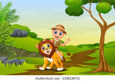 Happy zookeeper boy and lion in a park