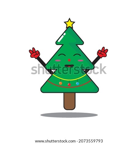 a hapy smiling christmas tree welcomes christmas 