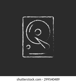 Hard disk hand drawn in chalk on a blackboard vector white icon on a black background