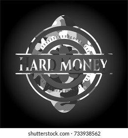 Hard Money on grey camouflaged texture