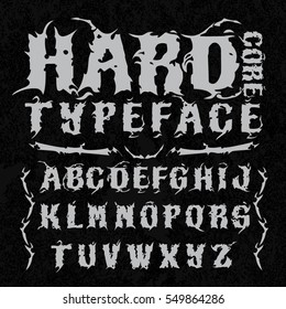 Hardcore typeface. Stylish grunge font on grunge background, good for labels, logos, posters, tee-shirts.