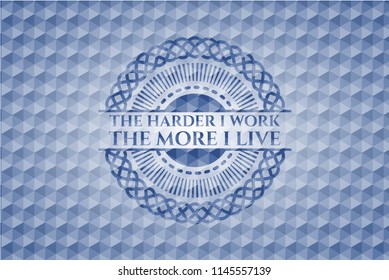 The Hardest I work the More I Live blue emblem with geometric pattern.