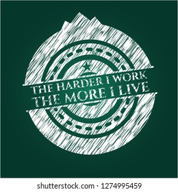 The Hardest I work the More I Live chalkboard emblem on black board