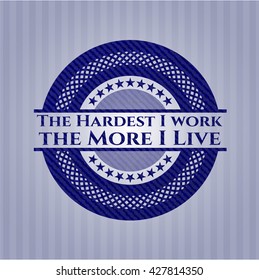 The Hardest I work the More I Live emblem with jean background