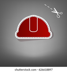 Hardhat sign. Vector. Red icon with for applique from paper with shadow on gray background with scissors.