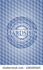 Hardship blue badge with geometric pattern.