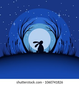 Hare or rabbit silhouette in the moonlit starry sky