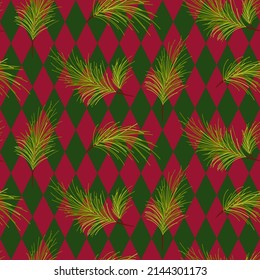Harlequin or argyle pattern green and red with pine tree branches. Christmas theme colors.