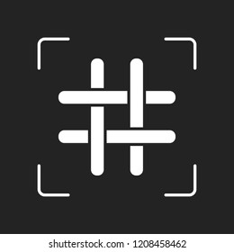 Hashtag icon. White object in camera autofocus on dark background