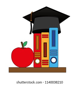 hat graduation with books and apple