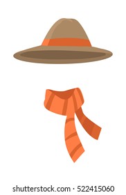 Hat. Longedged brown hat with long orange stripe. Orange scarf with brown lines twisted on the right . White background. Set of icons of winter unisex clothing. Flat design. Vector illustration