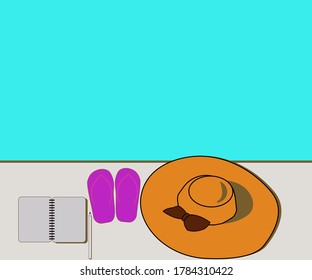 hat, sandals, pen and book by the pool