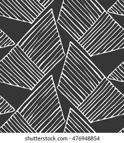 Hatched trapezoids on black.Hand drawn with ink and marker brush seamless background.