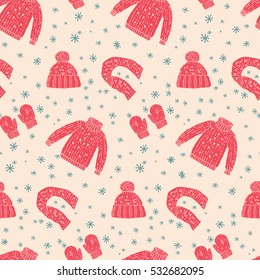 Hats, scarves, mittens, sweater. Vector seamless winter pattern. Cute background for a festive gift wrapping