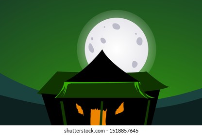 Haunted old house with the moon in background