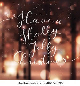 have a holly jolly christmas, vector lettering, handwritten text on blurred winter background with snowfall