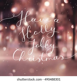 have a holly jolly christmas, vector lettering, handwritten text on blurred winter background with snowfall