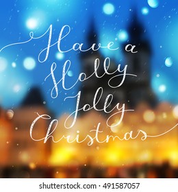 have a holly jolly christmas, vector lettering, handwritten text on blurred prague view and snowfall