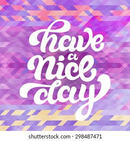 'Have a nice day' phrase on colorful abstract triangle background
