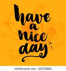 Have a nice day. Vector black ink calligraphy for cards, prints and social media content, fashion design. Positive quote, lettering on yellow grunge background.