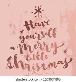 Have yourself A Merry Little Christmas. Christmas quote calligraphic greeting card in pink gold colors. Bronze texture luxury foil backround. Hand lettering. Merry Christmas design. Vector