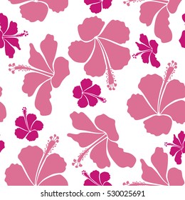 Hawaiian tropical natural floral seamless pattern in pink, magenta and beige colors. Hibiscus flowers on a white background in a trendy vector style.